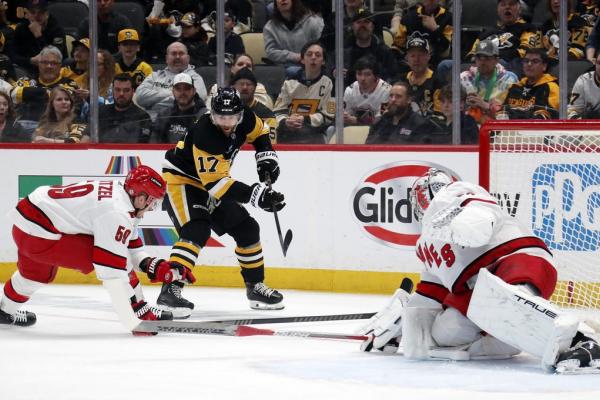Penguins end losing streak by cooling off Hurricanes