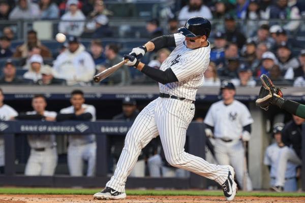 First-inning power helps Yankees turn back Athletics