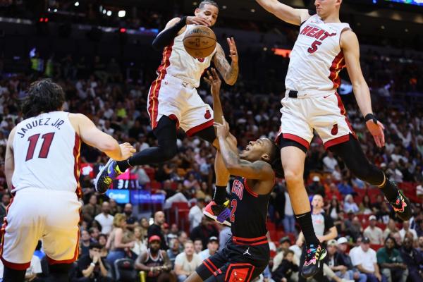 Heat dispose of Bulls, claim East playoff berth
