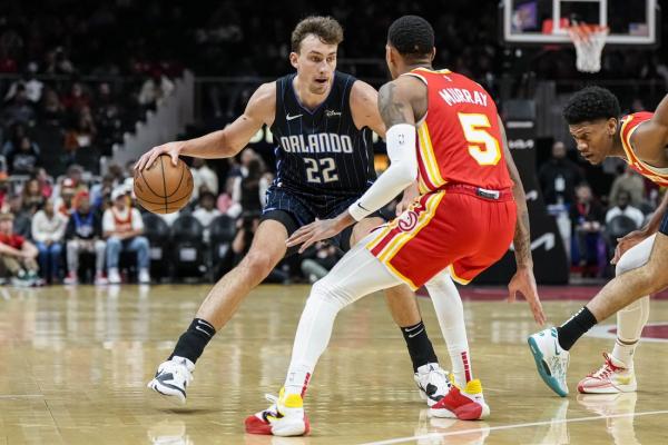 Dejounte Murray guides Trae Young-less Hawks past Magic