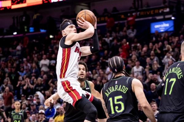 Heat hold off Pelicans as tempers flare