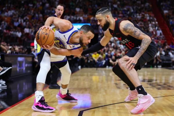 Warriors put clamps on Heat