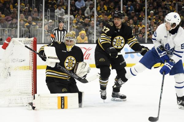 Bruins end Leafs' season with OT win in Game 7