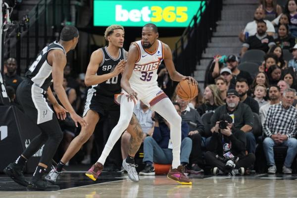 Booker, Durant combine for 57 points as Suns crush Spurs