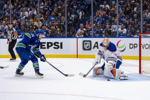 Evan Bouchard’s OT tally lifts Oilers over Canucks in Game 2