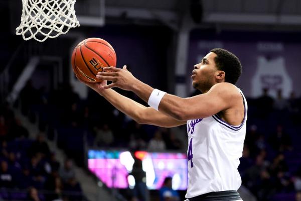 Balanced attack leads TCU past road-weary West Virginia