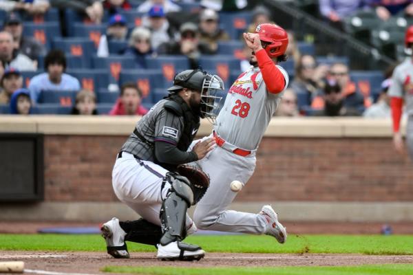 Cardinals go up early, hold off Mets