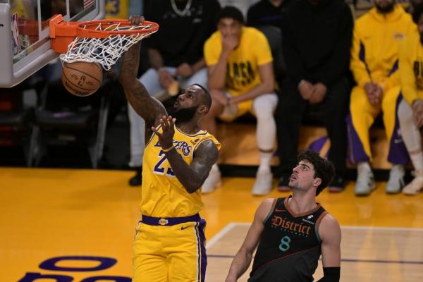 Lakers pull out OT win, extend Wizards’ skid