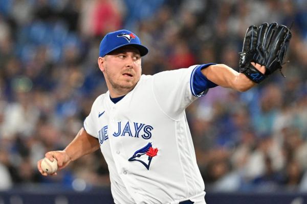Jays P Erik Swanson leaves camp after son hit by car
