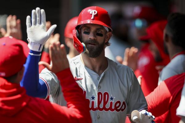 MLB roundup: Bryce Harper back, homers in Phillies’ win
