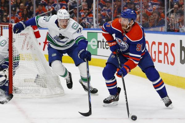 Oilers roll past Canucks 5-1, send series to Game 7
