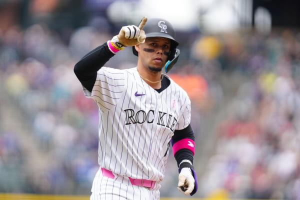 Rockies conclude three-game sweep of Rangers