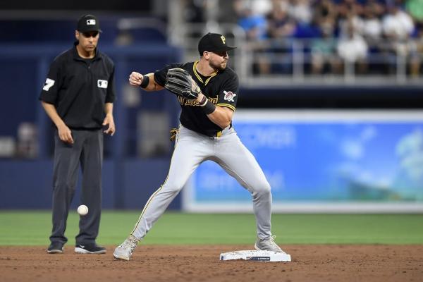 Pirates outlast Marlins in 12 innings to kick off season thumbnail